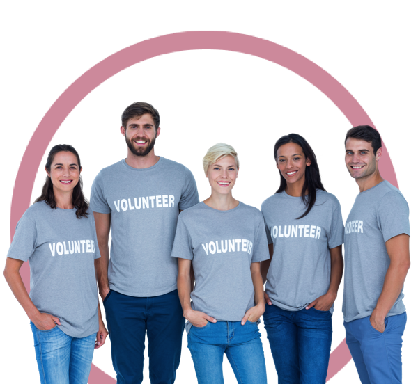 A group of people wearing volunteer t-shirts and smiling